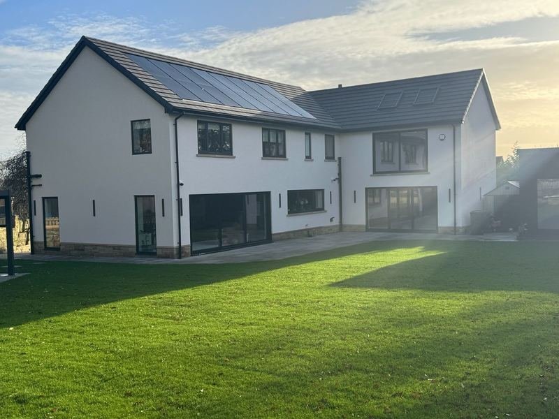 Rear of the house in Adel, Leeds after silicone render, with cladding to the front