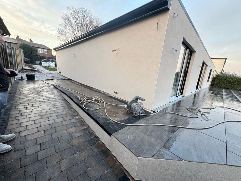 Side of the bungalow in Alwoodley, Leeds after monocouche render