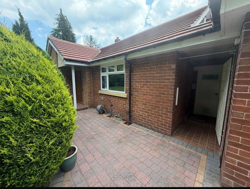 Side of the bungalow in Leeds LS28 before the work started