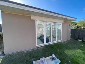 View of the garden bar in Whinmoor, Leeds after through-coloured render, photo 5