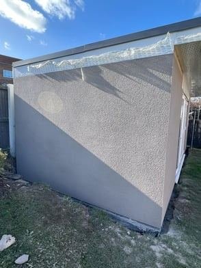 View of the garden bar in Whinmoor, Leeds after through-coloured render, photo 2