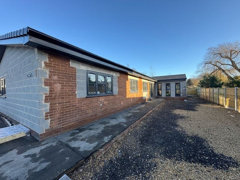 Side of the bungalow in Wakefield before the work started